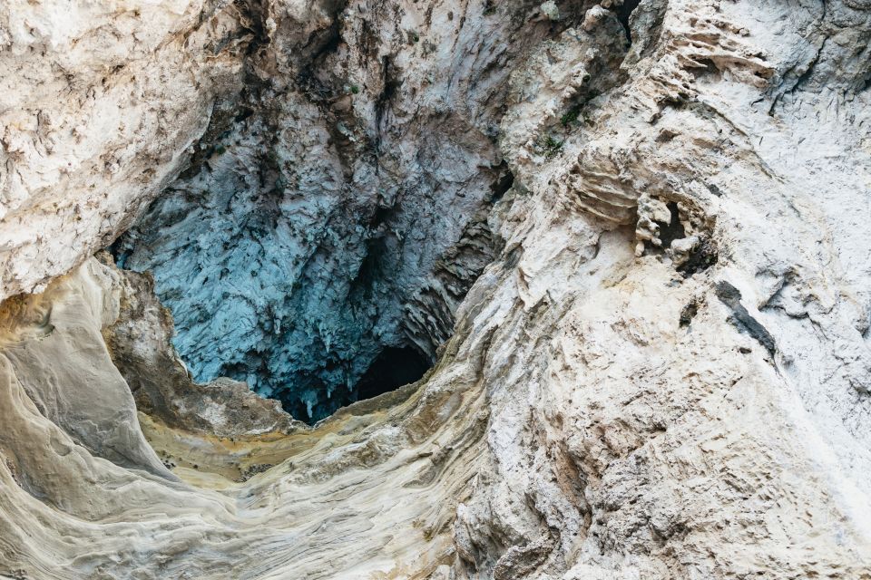 Capri: Island Boat Trip with Grottos - Faraglioni Rocks: the “close enough” stop that makes the whole trip feel worth it