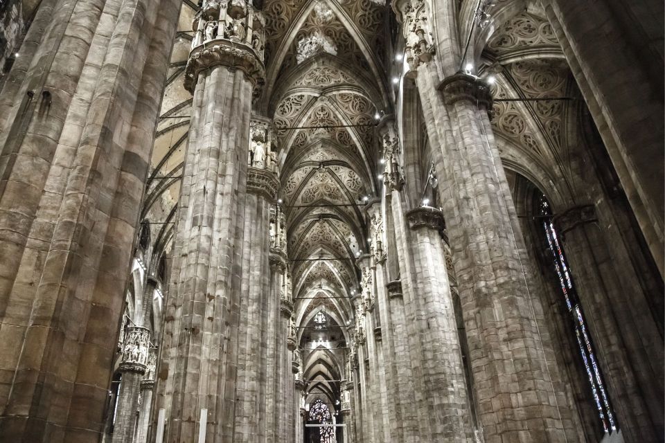 Milan: Duomo Rooftop and Cathedral Guided Tour with Tickets - Rooftop Walk: 135 Spires, Gargoyles, and a View You Can Read