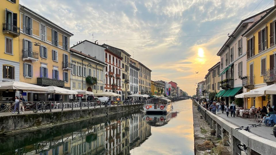 Milan: Navigli District Canal Boat Tour with Aperitivo - Naviglio Grande Views: Canal Houses, Bars, and the Past You Can Still See