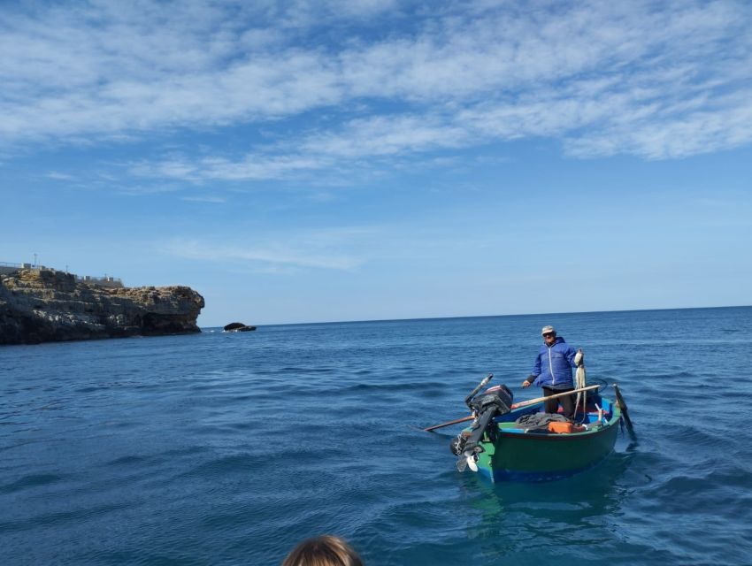 Polignano a Mare: Speedboat Cruise to Caves with Aperitif - Aperitif, wine, crackers, and music: the Polignano photo stop moment