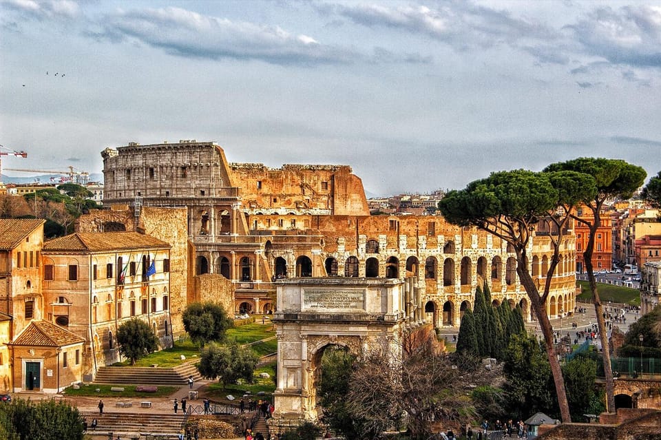 Rome: Colosseum, Forum, & Palatine Hill with Audio Guide - Roman Forum: government ruins and marketplace ground