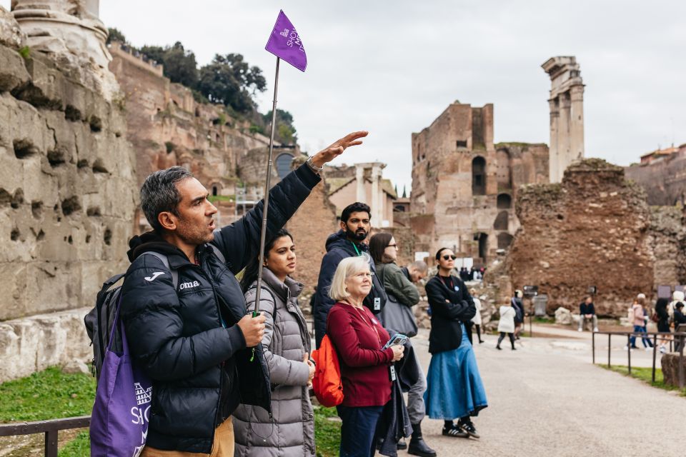 Rome: Colosseum, Palatine Hill & Roman Forum Guided Tour - Entering the Colosseum: Levels, Roman Numerals, and Engineering Marvels