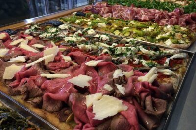 Rome Food Tour: Unlimited Tastings with Fine Wine & Barolo - Stop 1 at La Nicchia Café: truffles, cheese, and free-flowing Prosecco