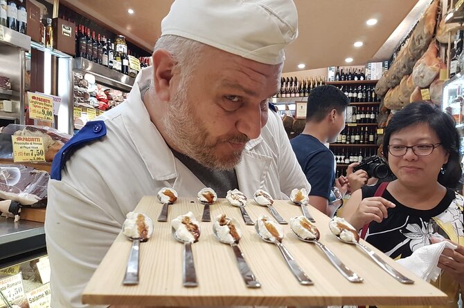 Rome Food Tour: Unlimited Tastings with Fine Wine & Barolo - Il Segreto: sitting down for classic Roman pasta