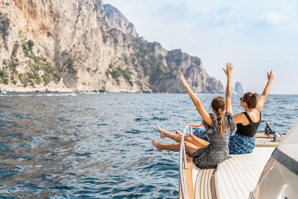 Sorrento: Exclusive Capri Boat Tour and Optional Blue Grotto - What onboard drinks and limoncello add to the experience